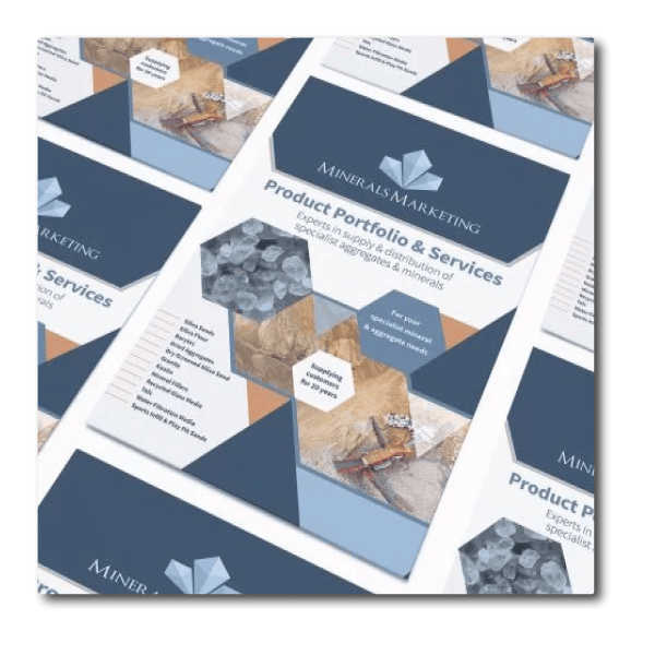leaflet 2 A table full of bespoke designed leaflets for Minerals Marketing