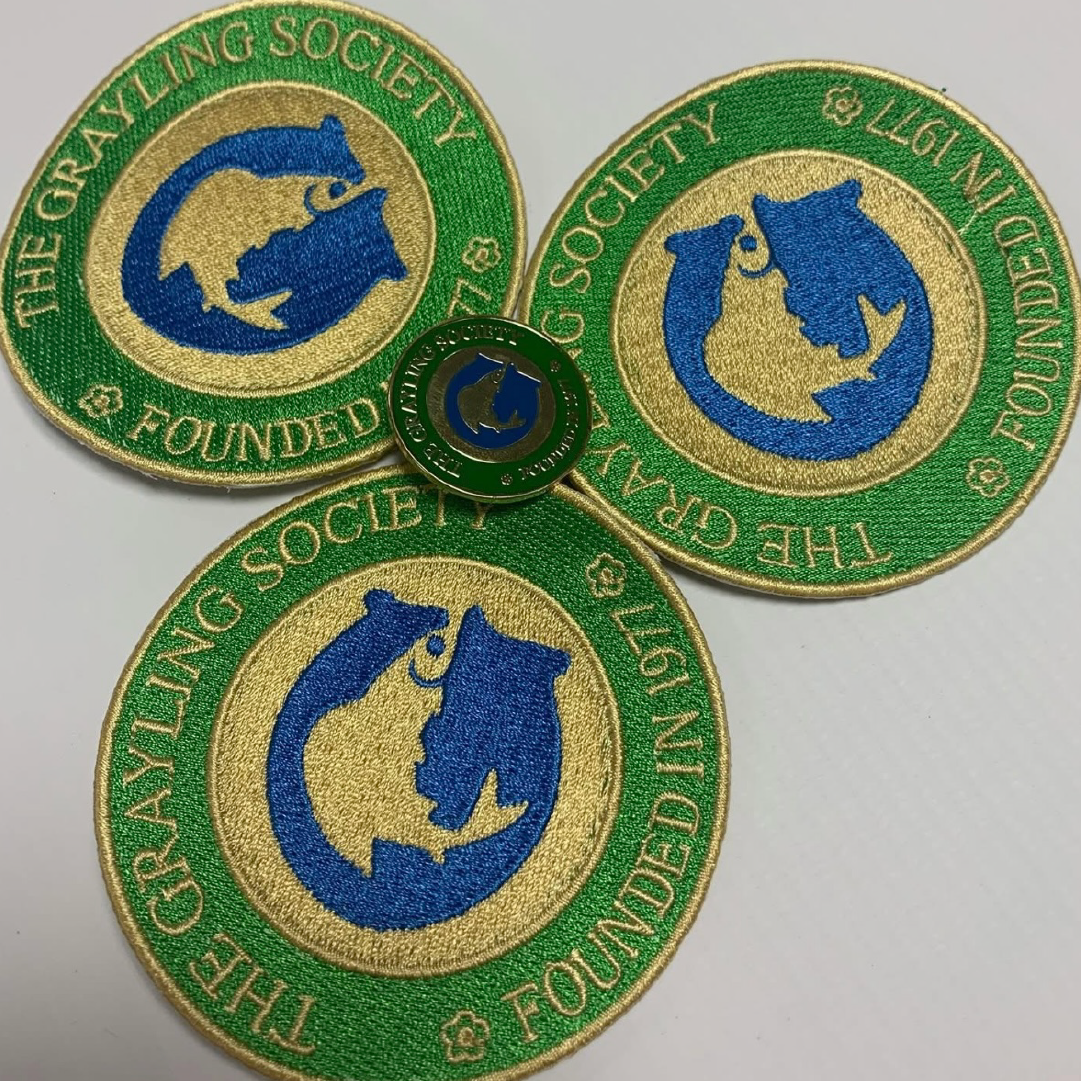 Bespoke colourful badges for the Grayling Society