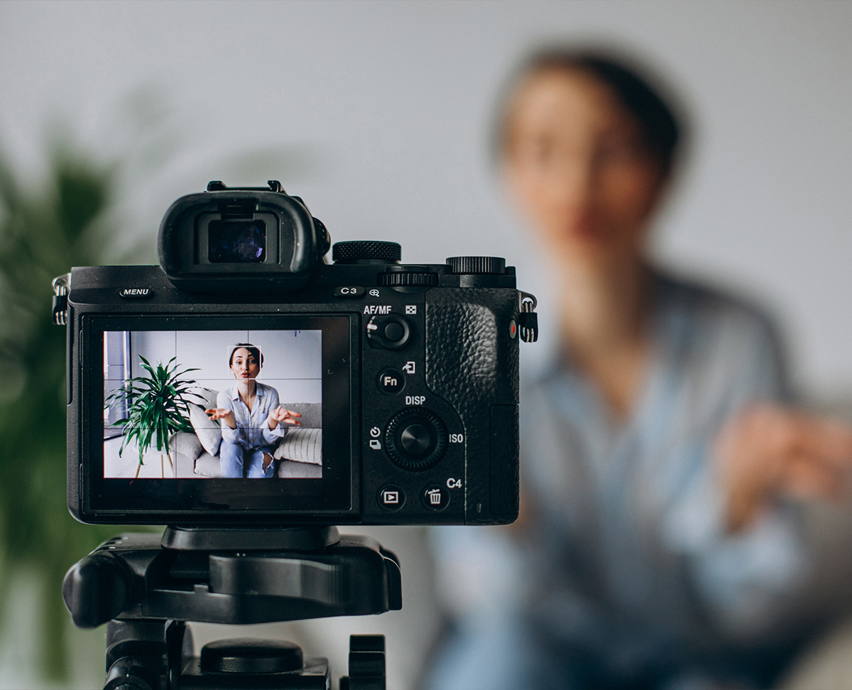 3:3 Content creator filming with camera on tripod – Macclesfield digital marketing video content creation