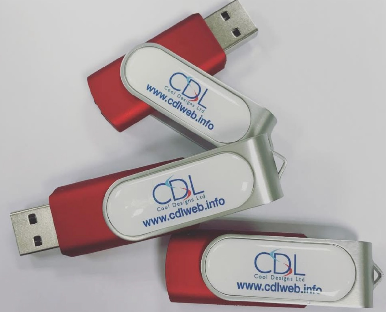 CDL Pendrive Branded red USB pendrives printed with logo for CDL Cool Designs Ltd