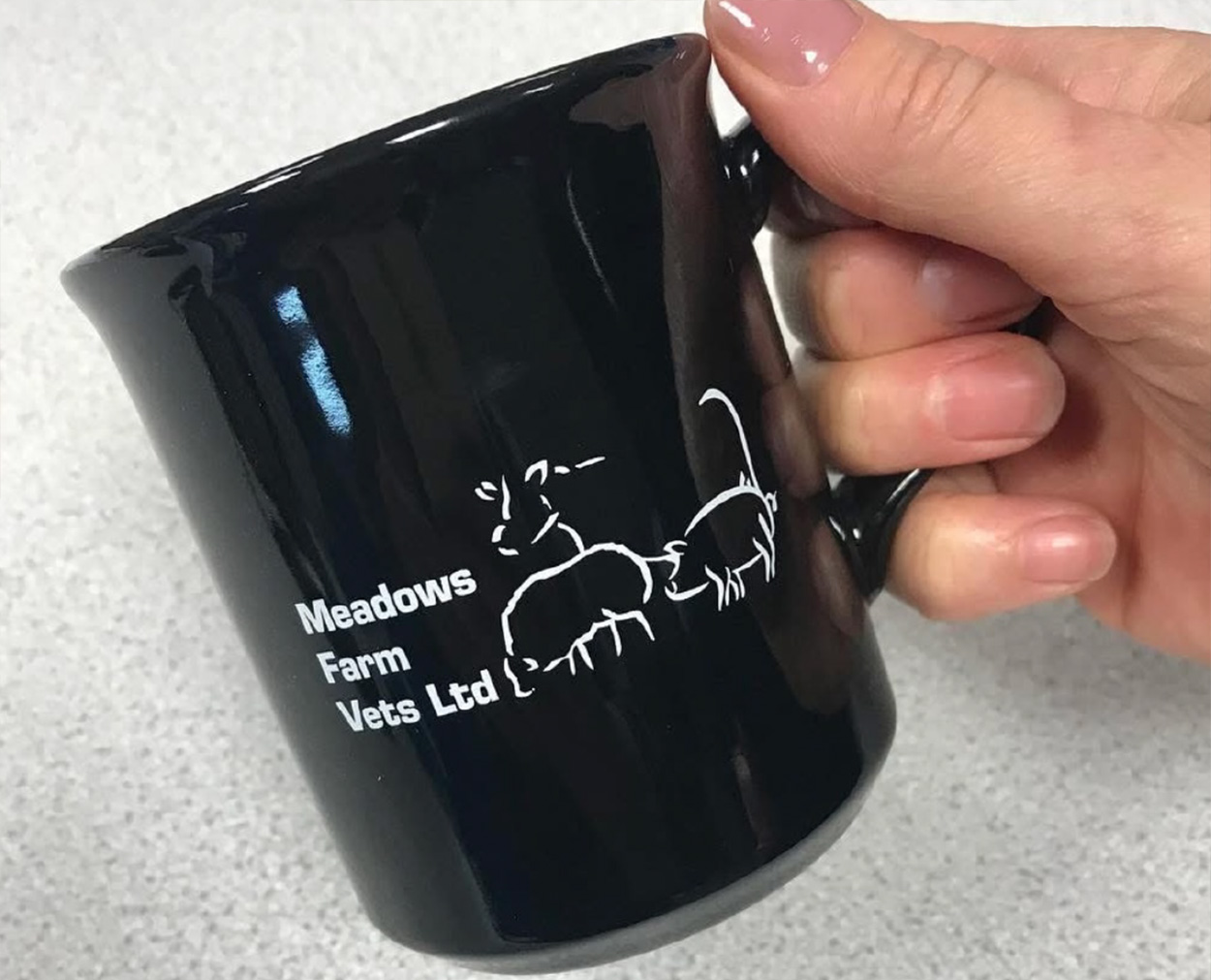Meadow Farm Vets Mug Printed black mug with logo design for Meadows Farm Vets Ltd