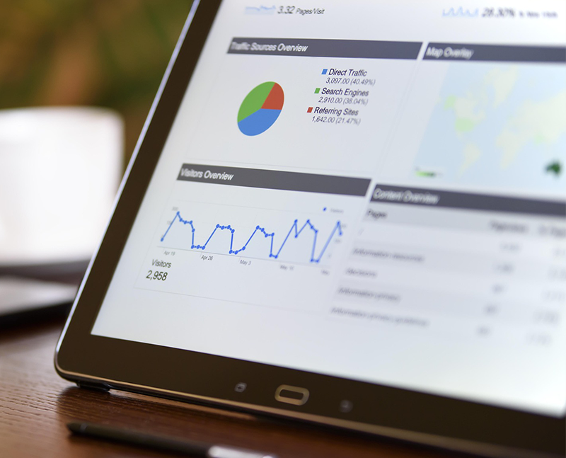 Marketing Analytics & Reporting – Design Office Stafford Analytics dashboard on tablet showing website traffic sources and visitor data, used by our Chester digital marketing agency