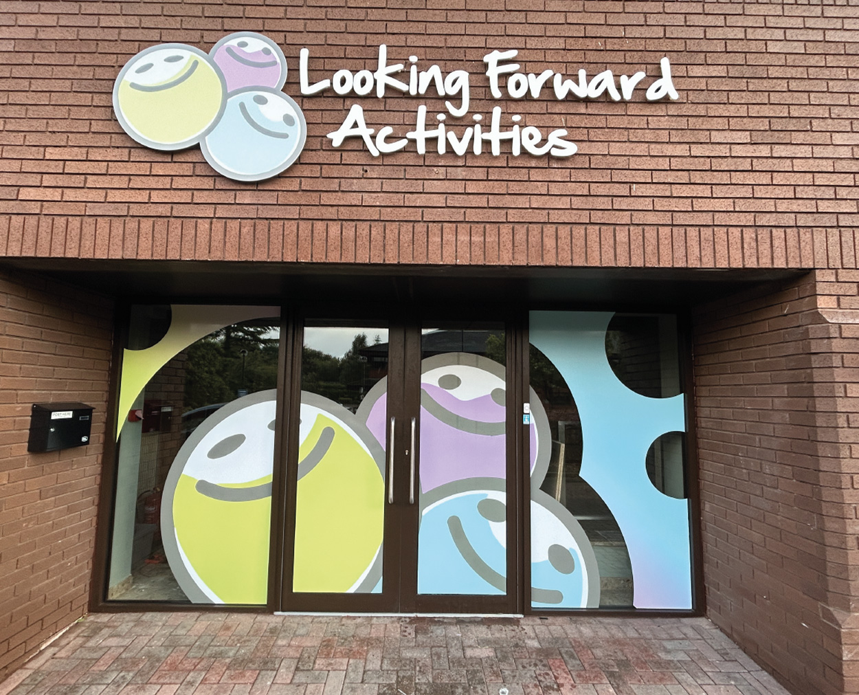 Looking Forward Activities Shopfront Signage Looking Forward Activities shopfront signage and window graphics design