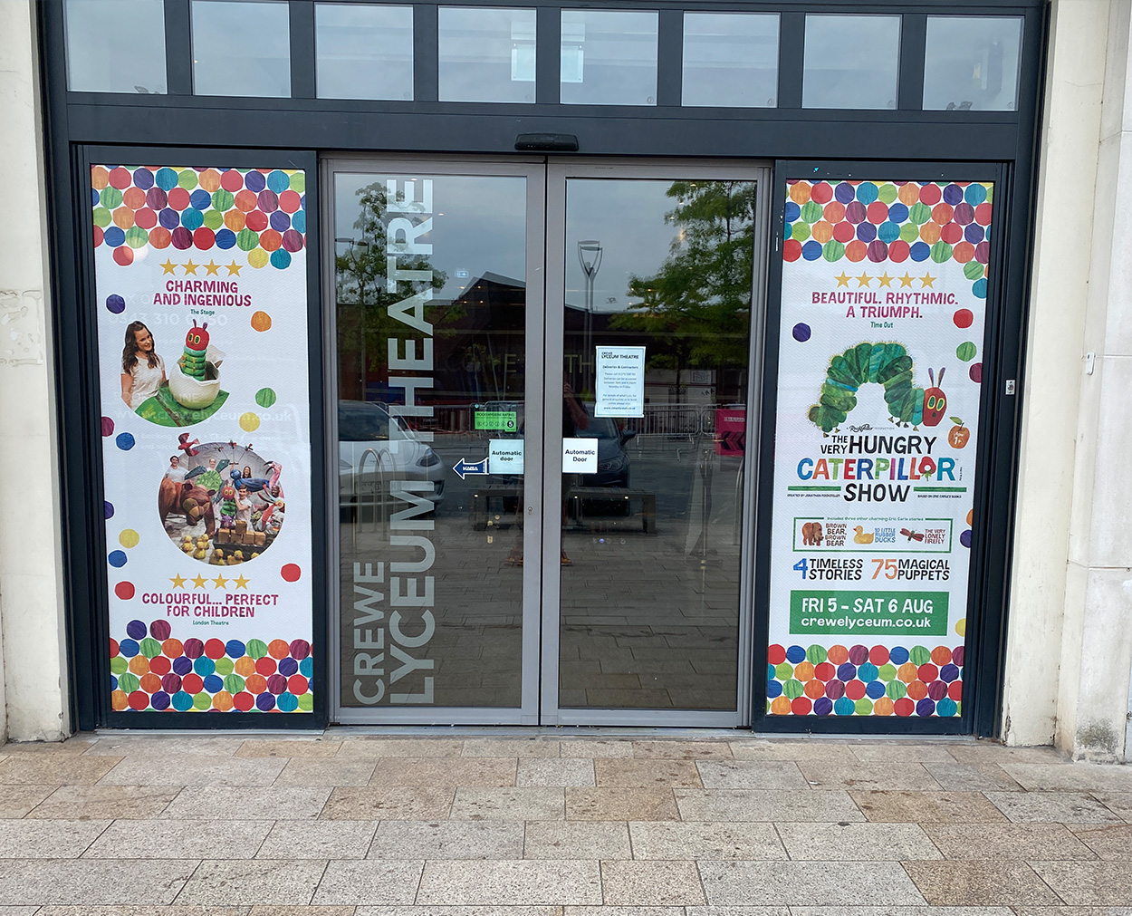 Theatre Entrance Poster and Window Graphics Design Crewe Lyceum Theatre entrance doors with Very Hungry Caterpillar Show poster graphics