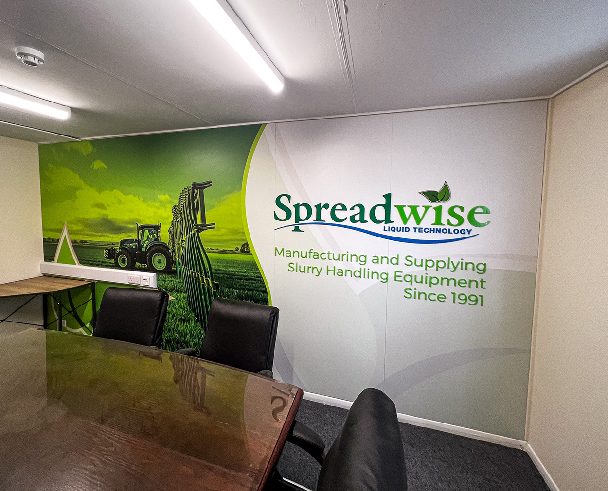 Large format wall graphic printed and installed for Spreadwise Liquid Technology meeting room